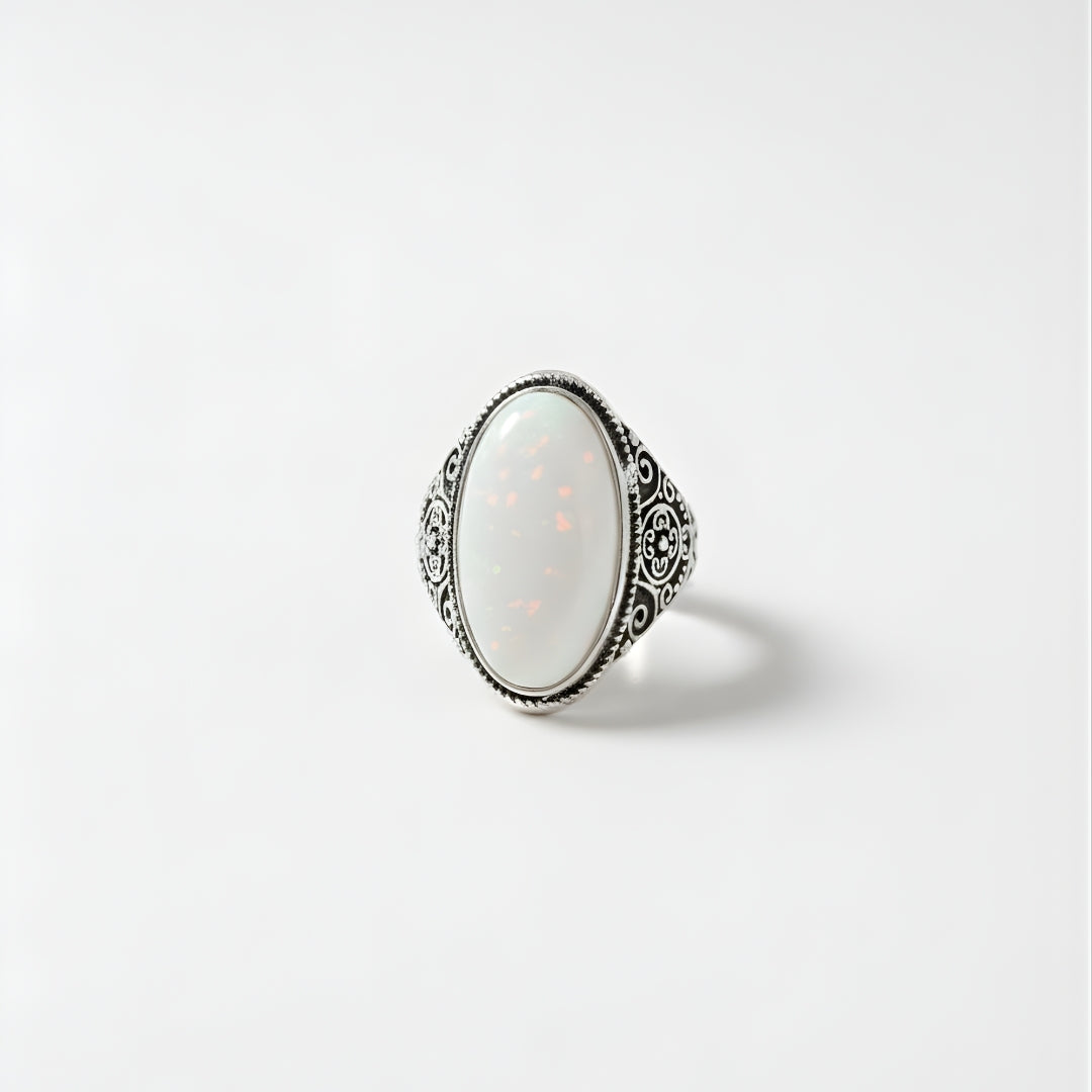 Tahitian Dawn Ring Perth Australia House of Hide silver ring with white stone on light gray background