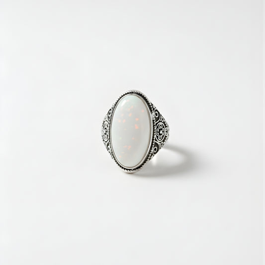 Tahitian Dawn Ring Perth Australia House of Hide silver ring with white stone on light gray background