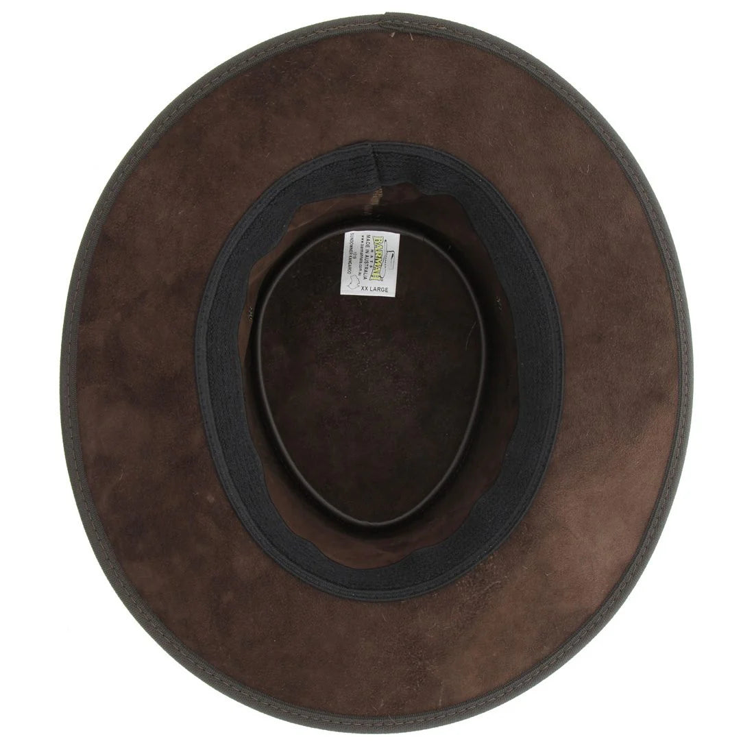 The Barmah Sundowner Kangaroo Leather Hat in Dark Brown displayed outdoors, highlighting its foldable design and matching braided leather hatband against a natural landscape.