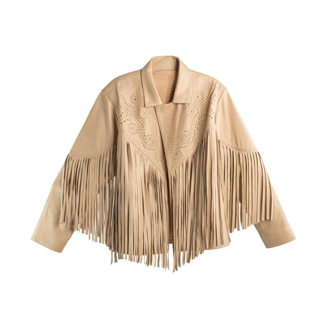 A beige faux-suede fringe jacket with a pointed collar, long sleeves, and intricate laser-cut eyelet detailing on the chest, displayed against a solid white background.