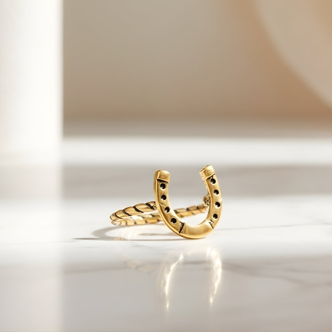 Elegant gold horseshoe-shaped ring Perth House of Hide minimalist product photo