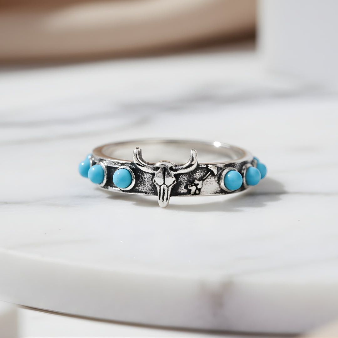 Bohemian silver ring featuring turquoise stones and bull motif Perth Australia House of Hide