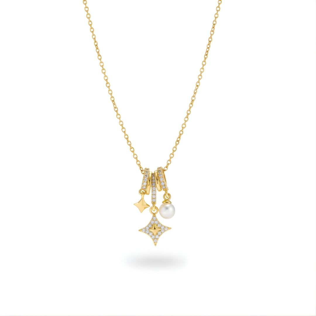 Twilight Sparkle Necklace Perth Australia House of Hide gold necklace with star pendants and pearl on white background