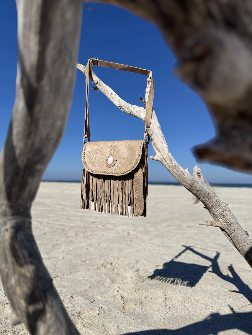 Unique handcrafted Dusty Pink handbag with fringe, tassels, and hand-tooled feathers – Australian made