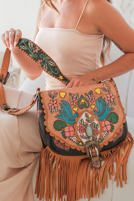 Western-inspired leather crossbody with buckle detail and magnetic flap. Ethically handmade, small batch boho bag Australia.