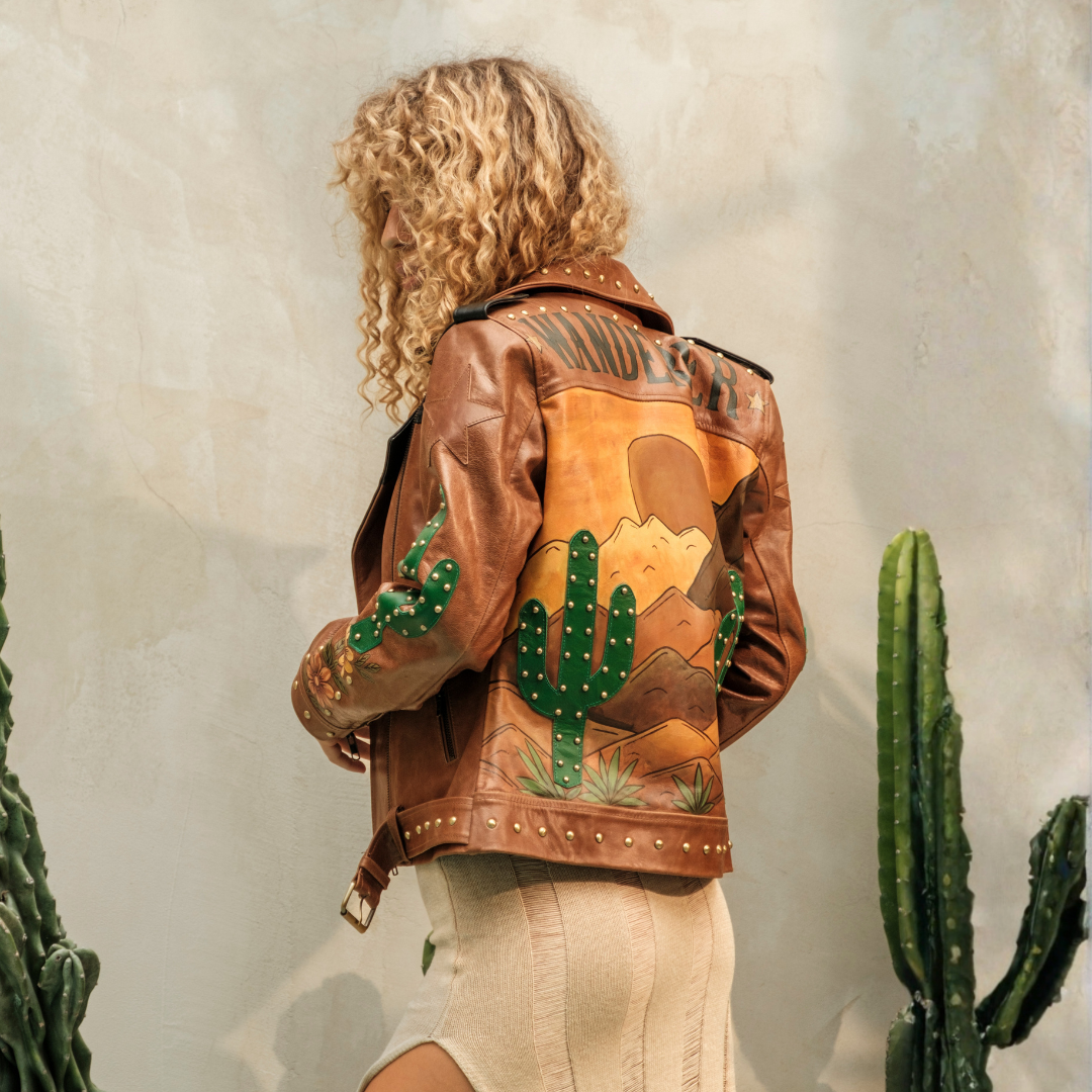 Women's handcrafted Western leather biker jacket with cactus artwork and studded detailing