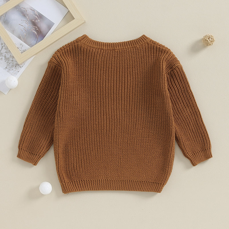 The back of the “Big Bro” Jumper is simple and clean—no print or embroidery, just a smooth, solid brown finish that highlights the soft cotton-poly blend. With its relaxed fit and classic crewneck cut, it’s comfy for layering or wearing on its own. The minimal back keeps the focus on the bold front lettering while offering timeless, everyday wearability.