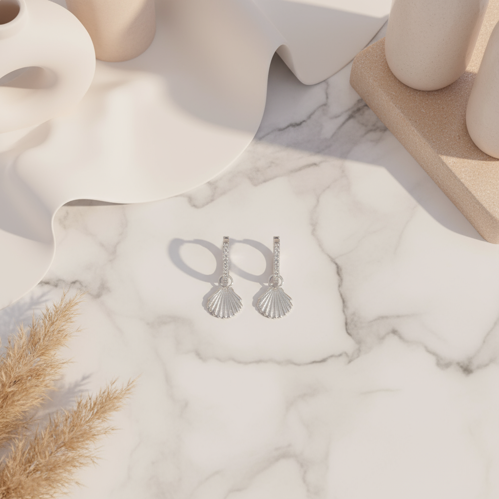 Silver hoop earrings featuring seashell pendant and shimmering zircon stones – ocean-inspired design by Houseofhide Australia