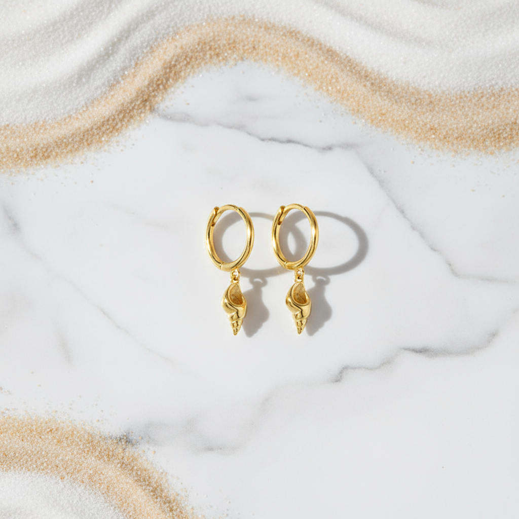 Shiny gold coastal hoop earrings with shell design – beach-inspired jewellery from Houseofhide