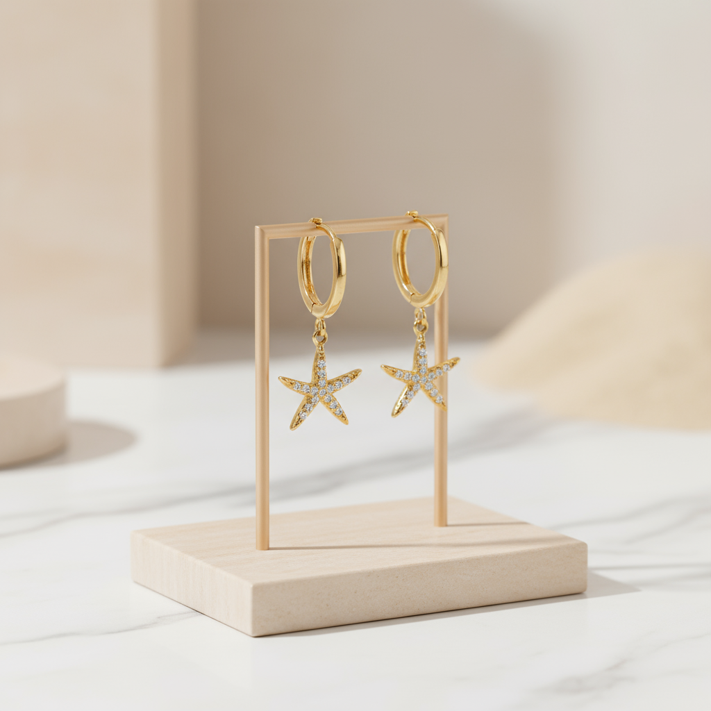 Lightweight coastal gold starfish hoops – beach-inspired earrings by Houseofhide