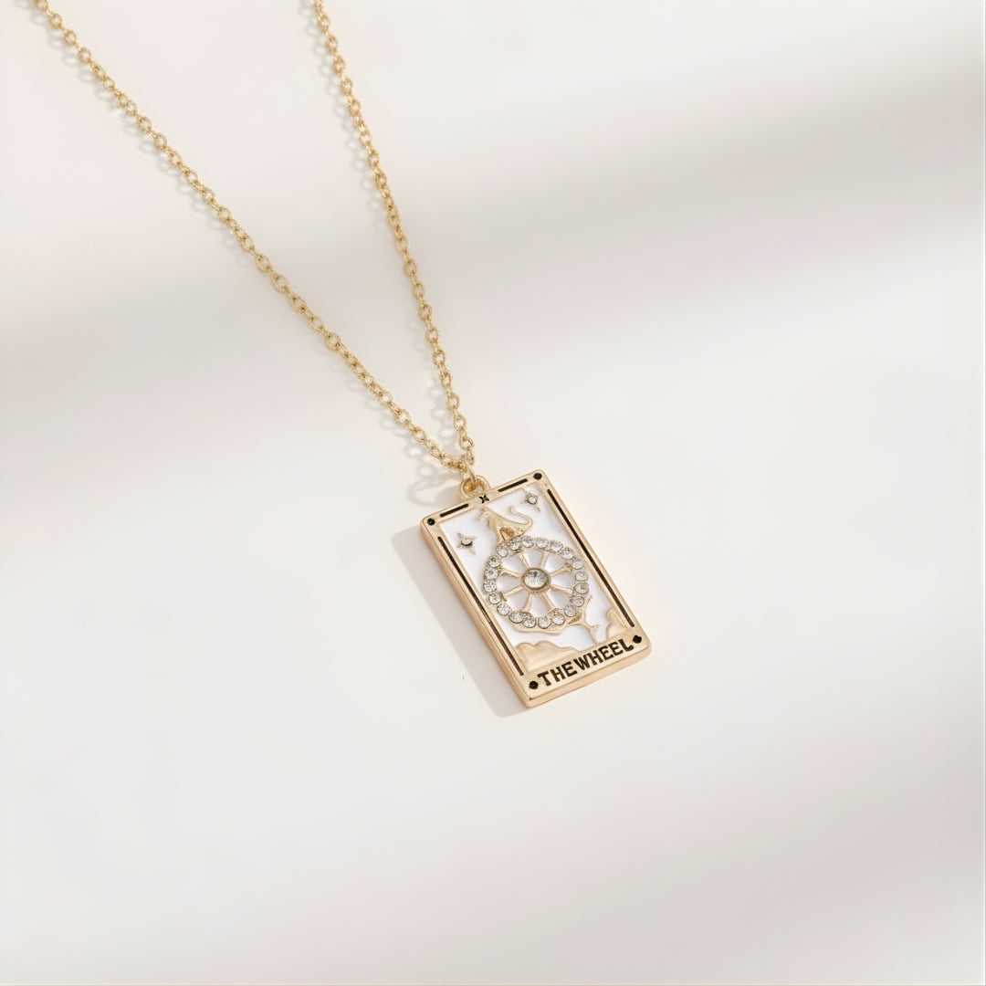 Elegant gold pendant necklace on marble backdrop Perth Australia House of Hide luxury jewellery