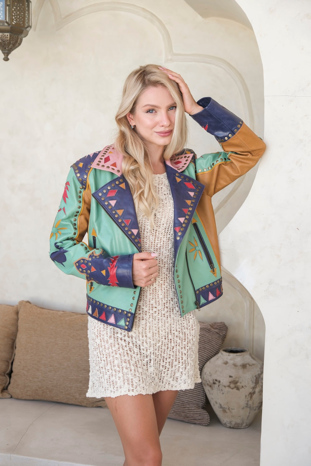 Desert-inspired statement jacket in premium patch leather with bold colours and hand-stitched sunburst back design. Limited edition. free people jacket australia