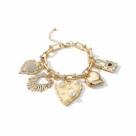 Golden Heart Charm Bracelet Perth Australia Houseofhide featuring gold heart charms with crystals and pearls on a tropical-inspired chain.