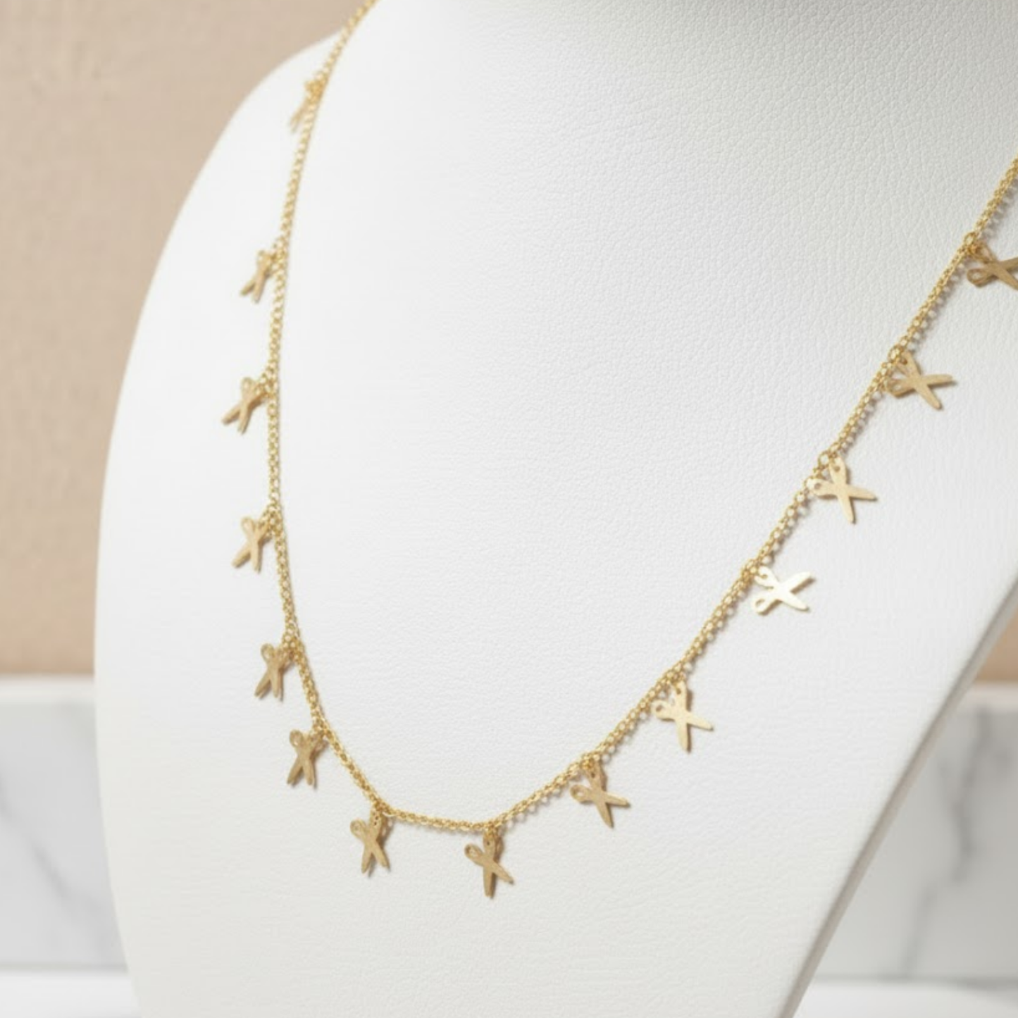 Golden Shear Breeze Necklace Perth Australia House of Hide gold chain necklace on a light background