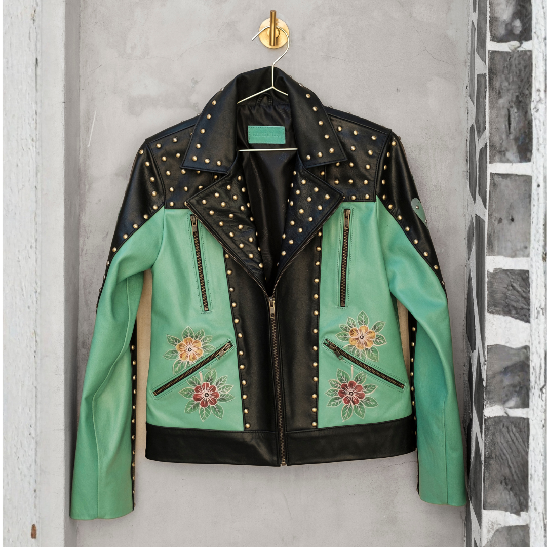 Women's genuine leather Western jacket with turquoise panels, hand-painted cactus artwork and longhorn skull design.