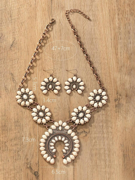 Rustic rodeo jewelry set sizing, antique copper squash blossom necklace and earrings, white stone statement jewelry.