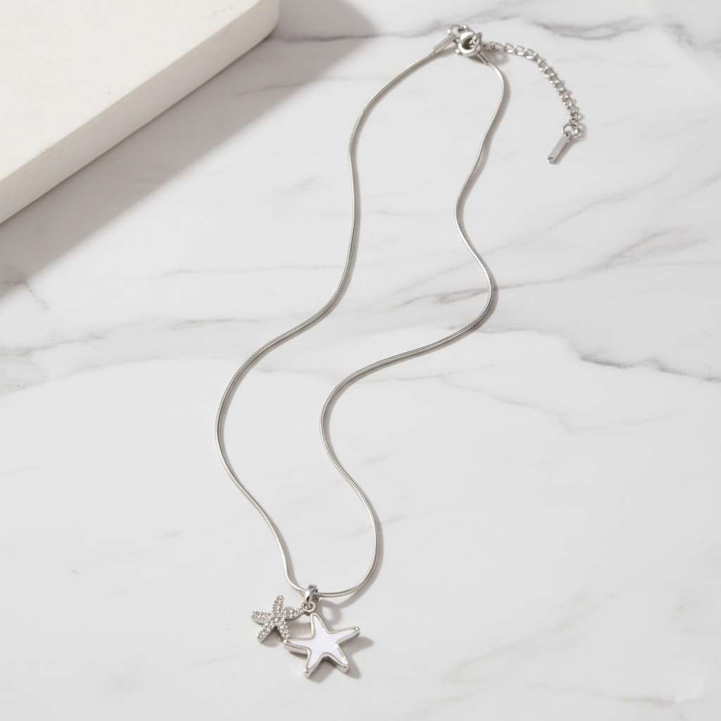 Ocean Starfish Necklace Perth Australia Houseofhide on reflective surface.