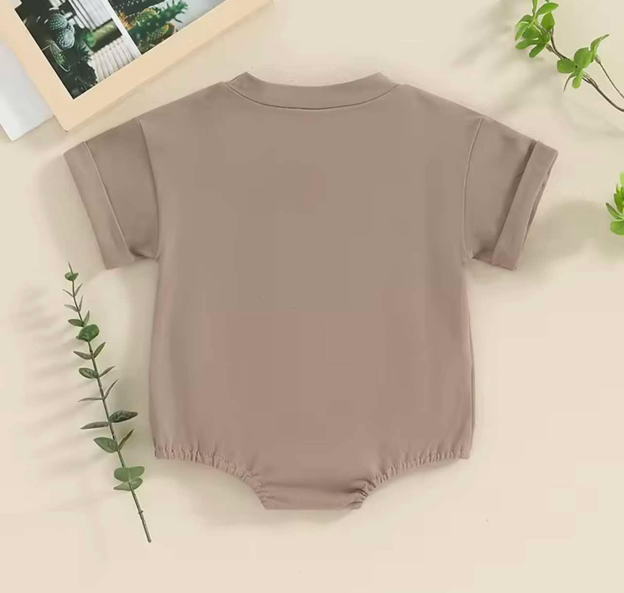 Back of Country-style baby onesie with snap closure, ideal for farm life and everyday wear – size 0–18 months