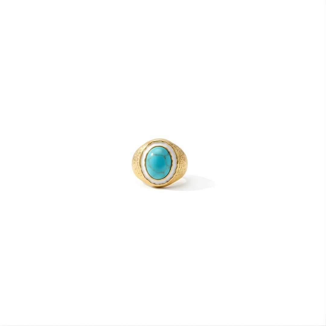 Paradise Gleam Ring Perth House of Hide turquoise stone gold ring displayed on marble surface