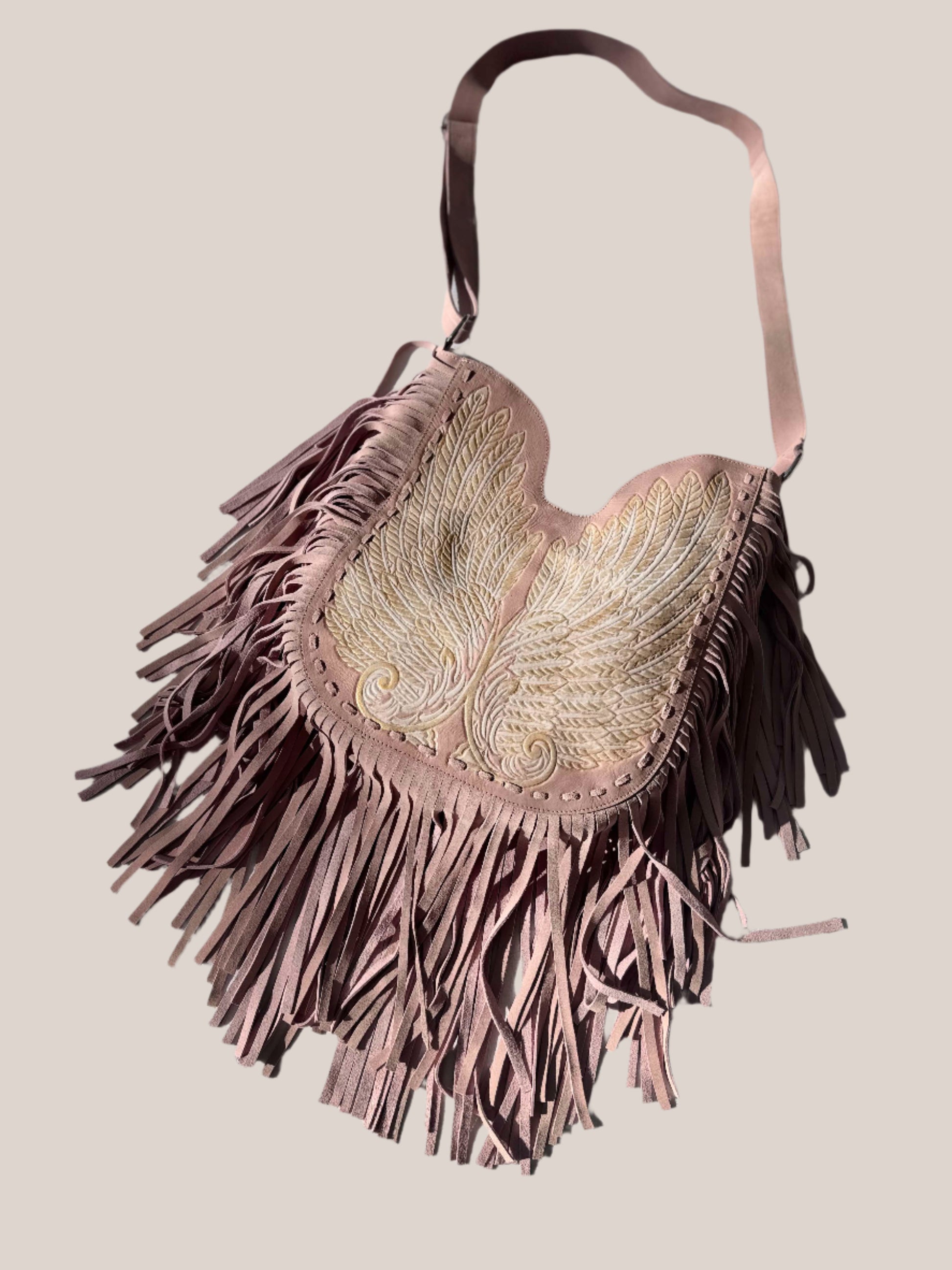 Bohemian-style shoulder bag with metallic embroidery and dusty rose leather