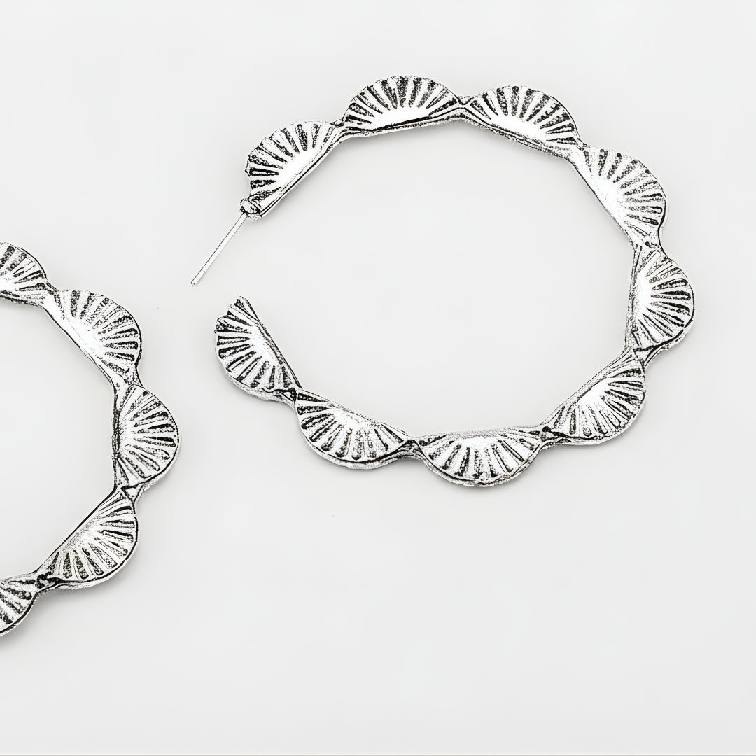 Sea Whisper Earrings Perth Australia House of Hide silver hoop earrings with scalloped edge on white background