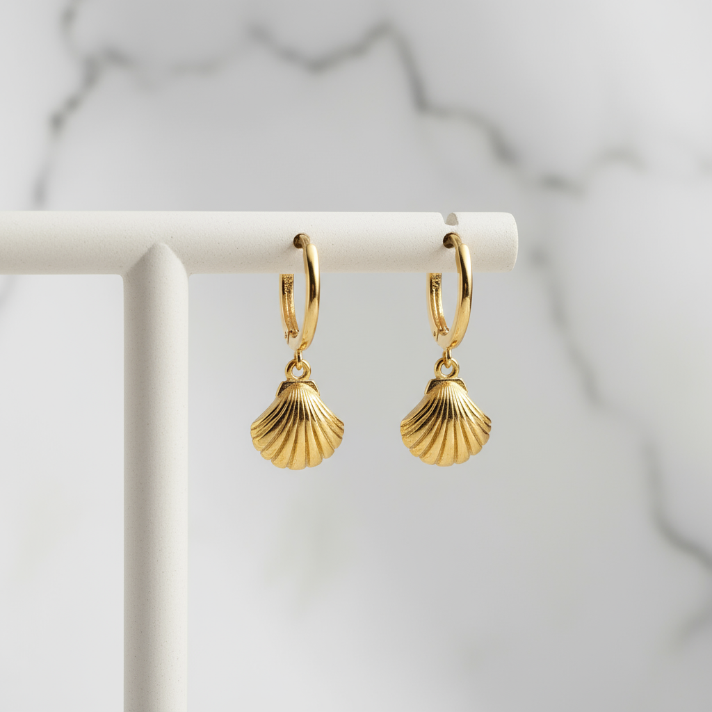 Golden shell hoop earrings with smooth curved design – Seaside Bay Hoops Houseofhide