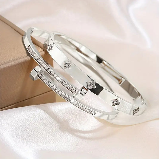 Silver stainless steel bracelet – side angle on white satin background