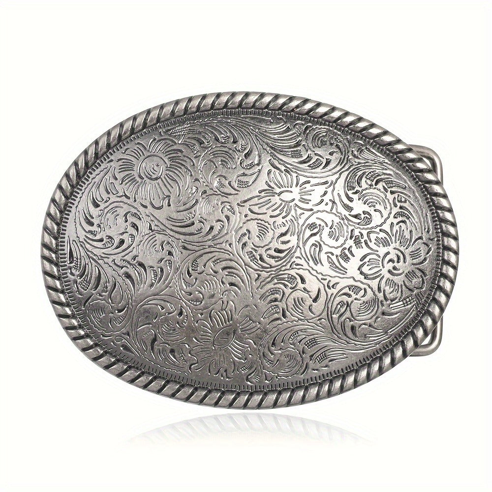 Silver vintage belt buckle with intricate floral patterns on a white background