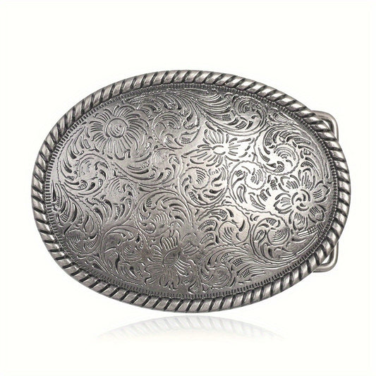 Silver vintage belt buckle with intricate floral patterns on a white background