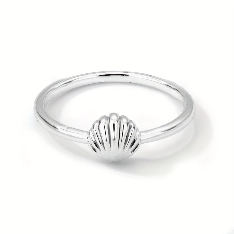Silvery seashell minimalist ring view on a white background