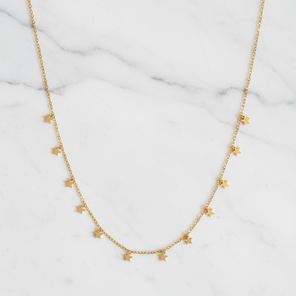 House of Hide Summer Starfall Necklace Perth Australia coastal-inspired gold necklace with shimmering stars